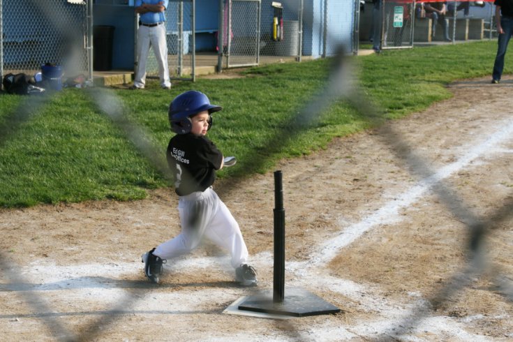 Whacking the ball into the outfield